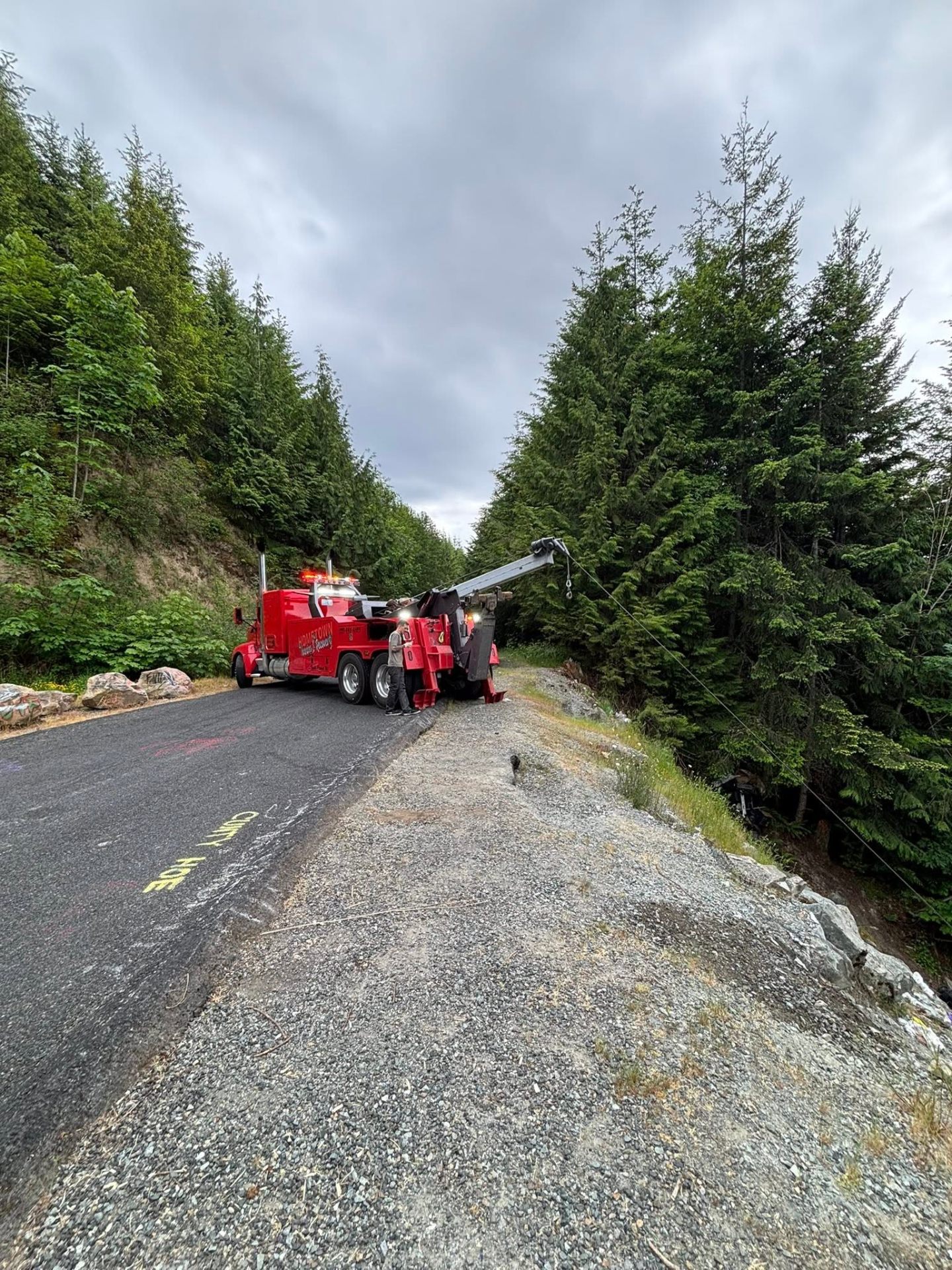 Hometown Towing heavy recovery truck on a forest road